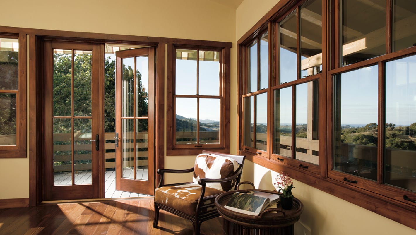 Какие деревянные окна лучше для загородного дома?